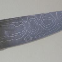 Détail lame feuilletée 60 couches motifs en oeil