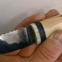 Couteau fixe XC 120, manche cerf, cuir et if, 140 euros